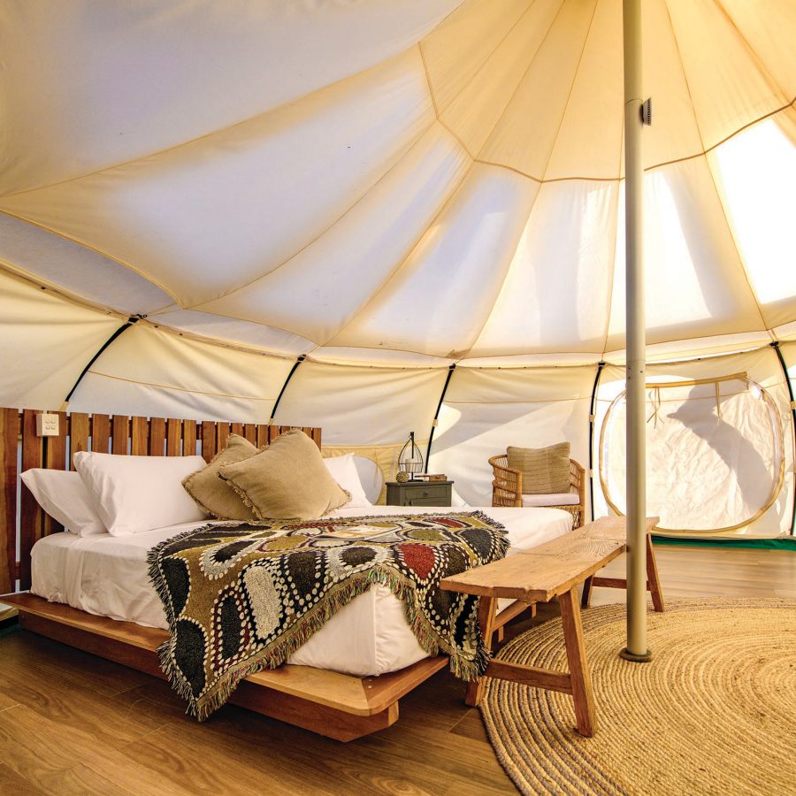The interior of a tent at Rangelands Outback Camp is sunny and cosy.